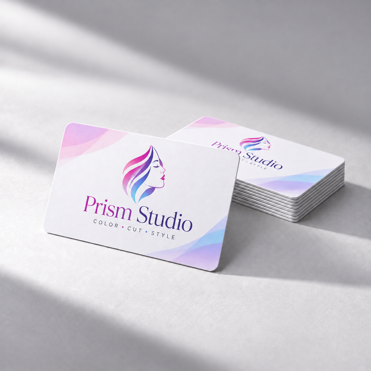 Official Pocket Factory sample design: NFC card design for a hair salon (Prism Studio mockup) that opens a booking page.
