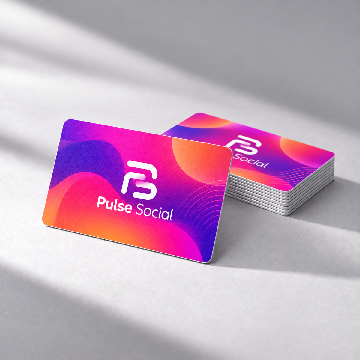 Official Pocket Factory sample design: NFC card design for a social media brand (Pulse Social mockup) that opens an Instagram or TikTok profile.