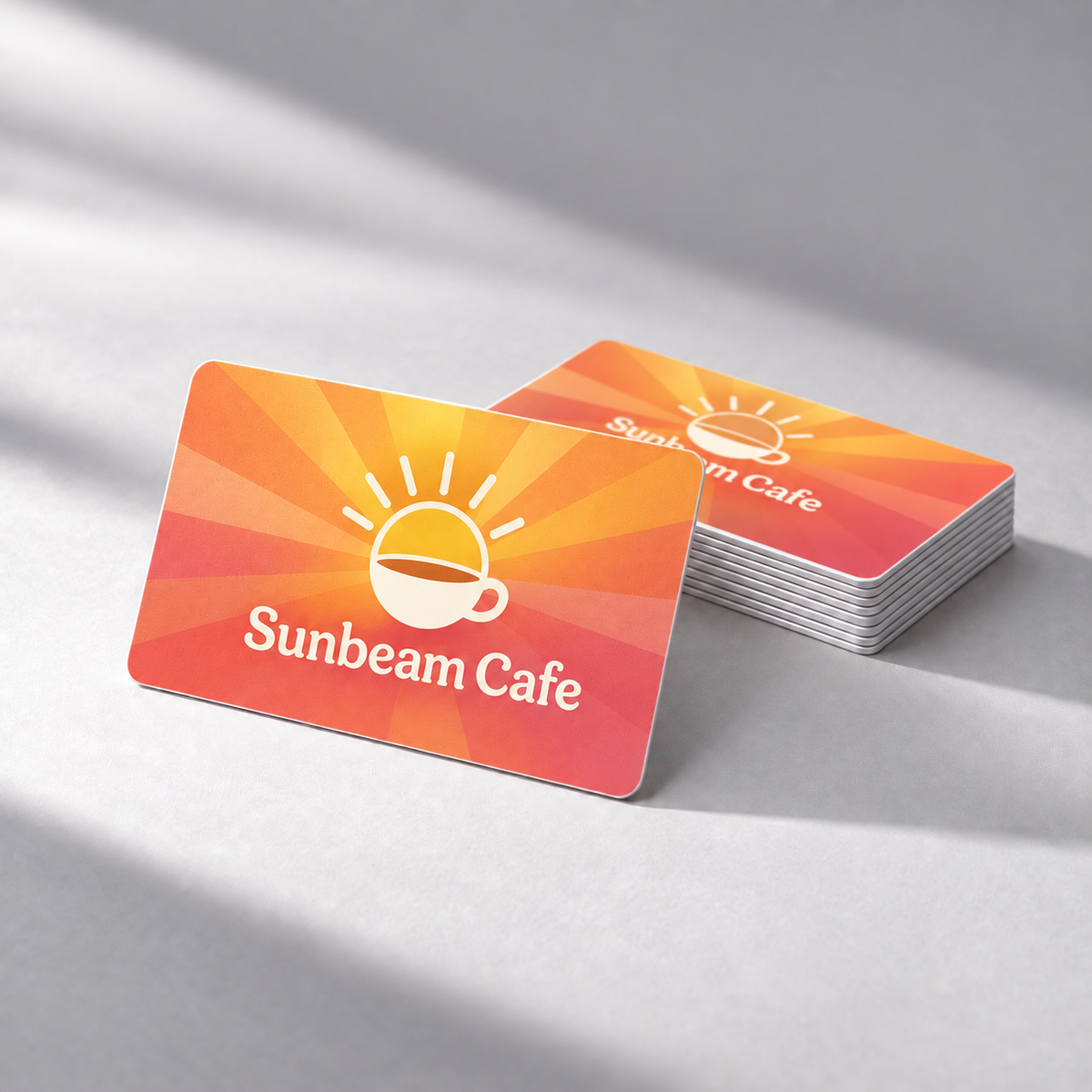 Official Pocket Factory sample design: NFC card design for a cafe (Sunbeam Cafe mockup), printed with the cafe's logo.